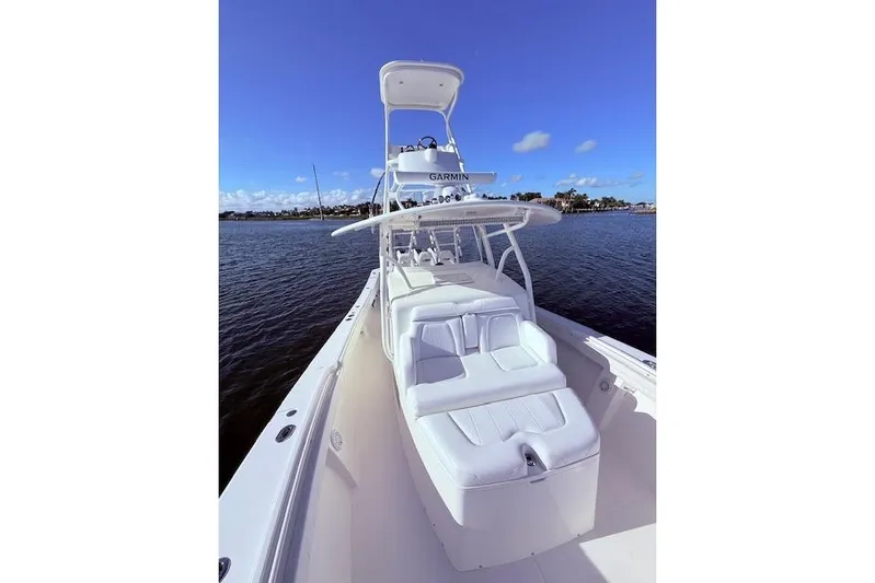  Yacht Photos Pics 2017 Regulator 41 boat on water, featuring sleek white seating and Garmin equipment.