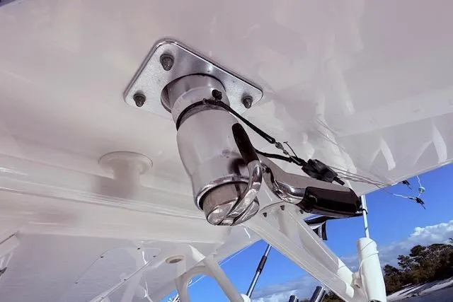  Yacht Photos Pics Close-up of a 2017 Regulator 41 boat's mounted spotlight under a clear blue sky.