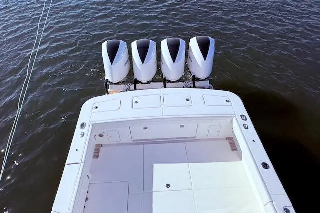  Yacht Photos Pics 2017 Regulator 41 boat with four powerful outboard engines on water.