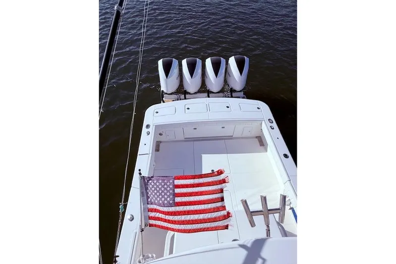  Yacht Photos Pics 2017 Regulator 41 boat with four engines and American flag on deck.