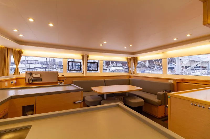 Why Not Yacht Photos Pics Interior of 2019 Lagoon 450F catamaran with modern seating and panoramic windows.