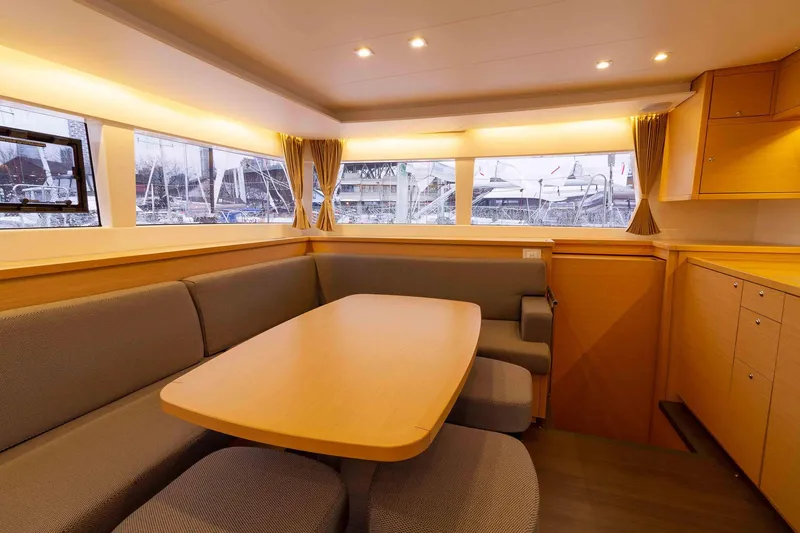 Why Not Yacht Photos Pics Interior of 2019 Lagoon 450F yacht with spacious seating and large windows.