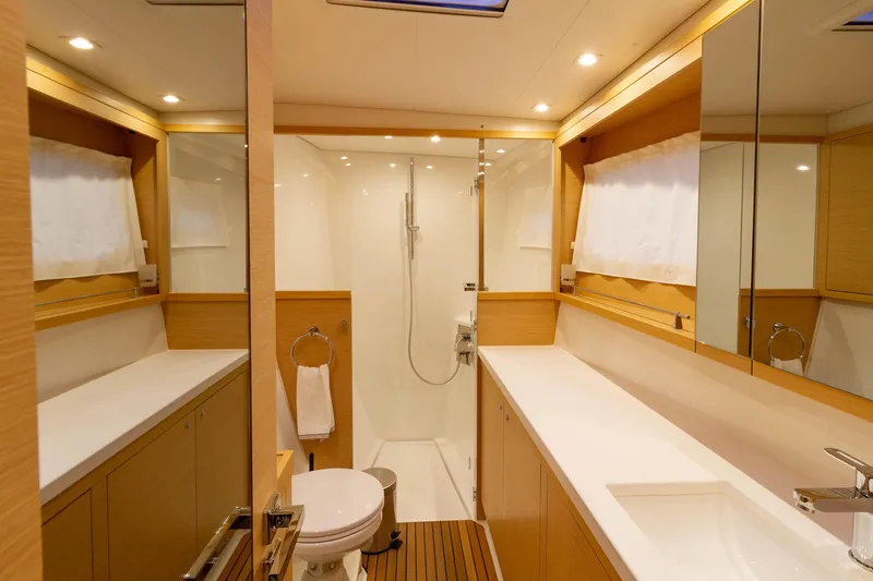 Why Not Yacht Photos Pics Luxurious bathroom interior of 2019 Lagoon 450F yacht, featuring modern fixtures and elegant design.