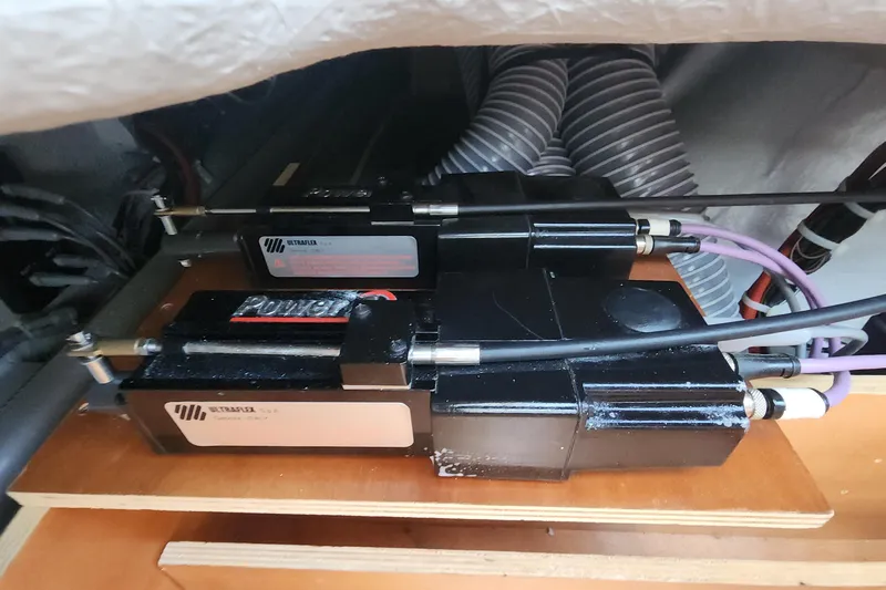 Why Not Yacht Photos Pics Ultraflex power steering system in 2019 Lagoon 450F yacht, featuring hydraulic components and cables.