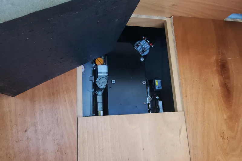 Why Not Yacht Photos Pics Hidden compartment in 2019 Lagoon 450F yacht with mechanical components visible.