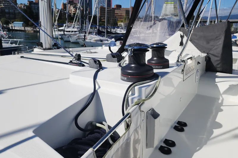 Why Not Yacht Photos Pics 2019 Lagoon 450F yacht deck with winches and ropes in marina setting.
