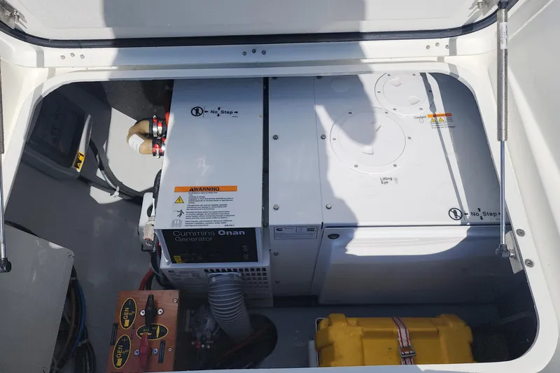 Why Not Yacht Photos Pics Engine compartment of a 2019 Lagoon 450F with Cummins Onan generator.