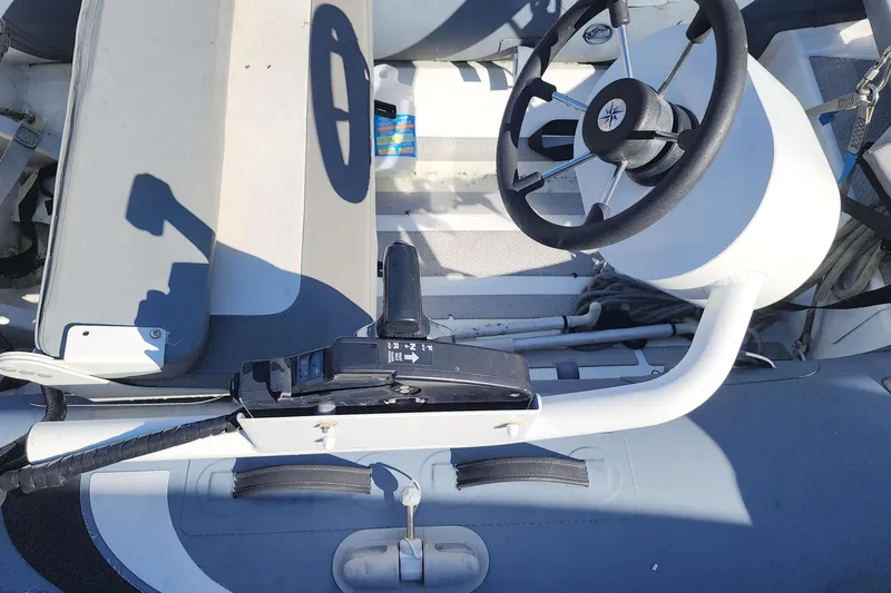 Why Not Yacht Photos Pics Steering wheel and controls of a 2019 Lagoon 450F catamaran yacht.