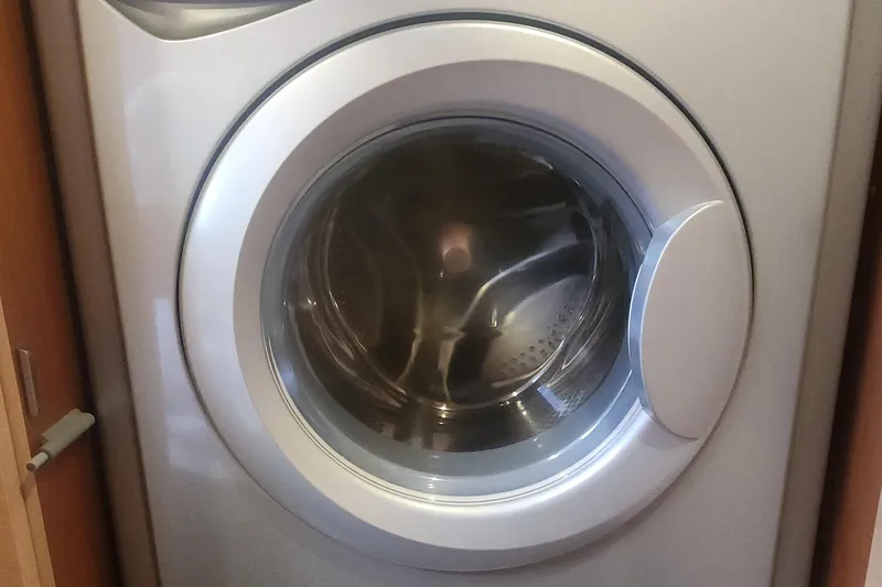 Why Not Yacht Photos Pics Front-loading washing machine inside a 2019 Lagoon 450F yacht.