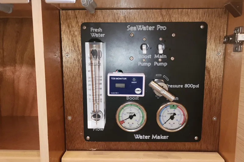 Why Not Yacht Photos Pics Control panel of a 2019 Lagoon 450F water maker system with gauges and switches.