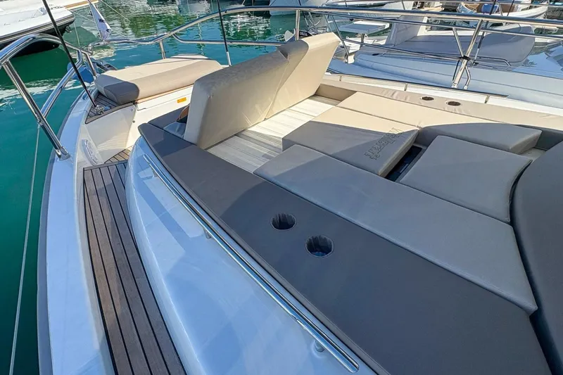  Yacht Photos Pics 2026 Wellcraft 44 Explorer yacht with luxurious deck seating and sleek design.