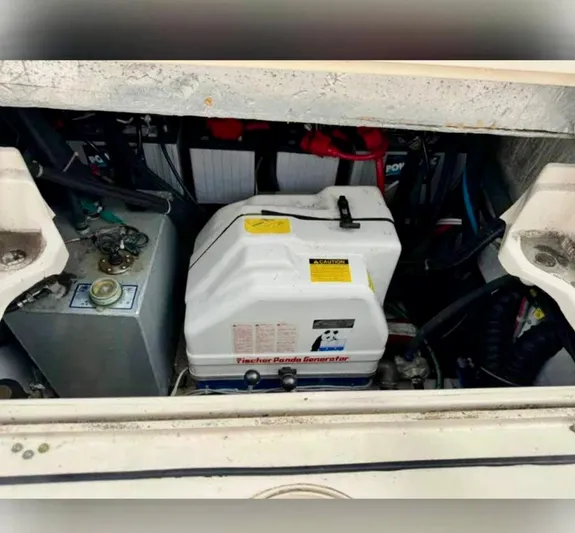  Yacht Photos Pics Engine compartment of a 2008 Grady-White Express 330 boat, featuring a Panda generator.
