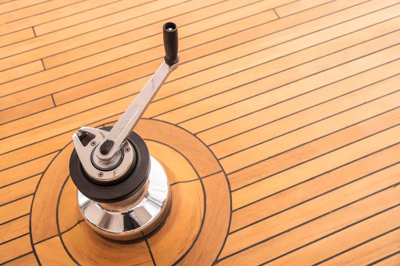 Le Pietre Yacht Photos Pics Winch handle on teak deck of 2009 Custom Sailing Yacht.