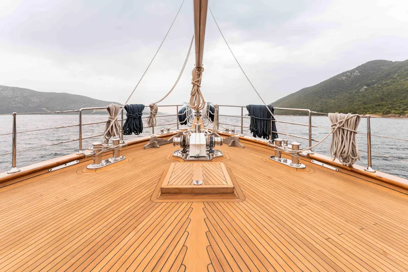 Le Pietre Yacht Photos Pics Custom 2009 sailing yacht with teak deck, cruising in scenic waters.