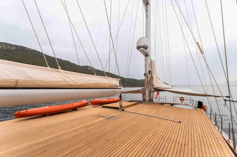 Le Pietre Yacht Photos Pics Custom 2009 sailing yacht with wooden deck and lifeboats on calm sea.