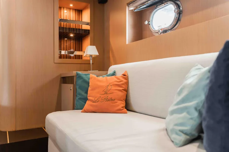 Le Pietre Yacht Photos Pics Interior of a 2009 custom sailing yacht with cozy seating and decorative pillows.