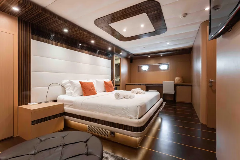 Le Pietre Yacht Photos Pics Luxurious bedroom interior of a 2009 custom sailing yacht with modern design and elegant furnishings.