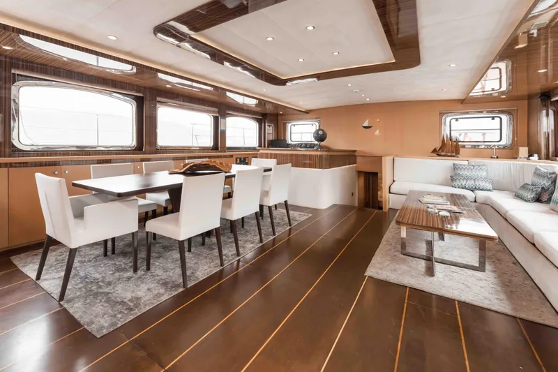 Le Pietre Yacht Photos Pics Luxurious interior of a 2009 custom sailing yacht with modern dining and lounge areas.