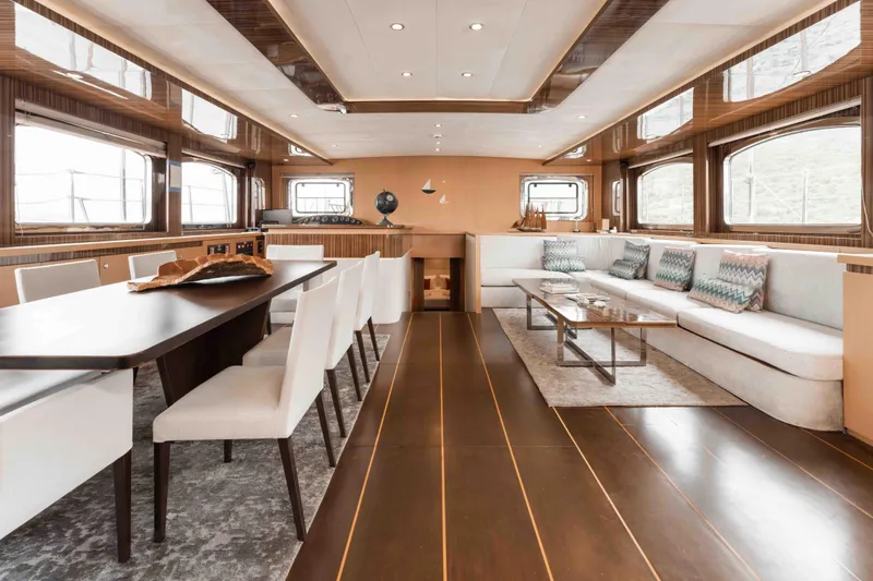 Le Pietre Yacht Photos Pics Luxurious interior of a 2009 custom sailing yacht with modern dining and lounge areas.