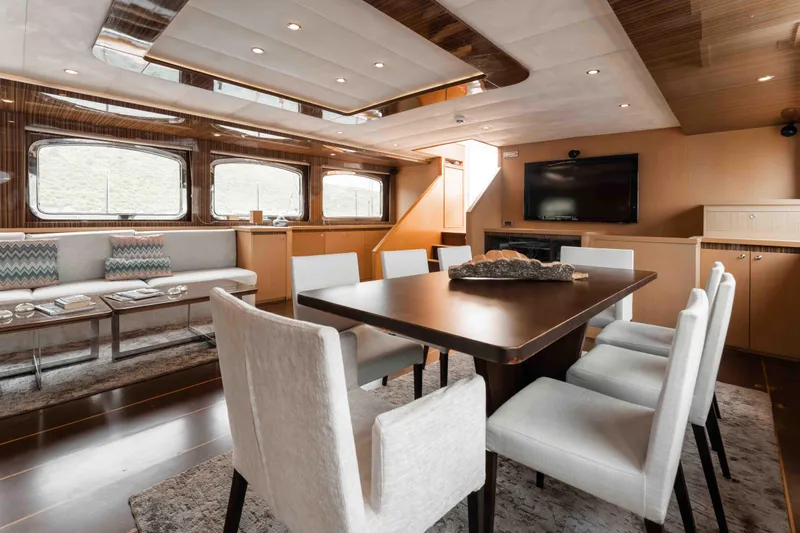 Le Pietre Yacht Photos Pics Luxurious interior of a 2009 custom sailing yacht with dining area and lounge.