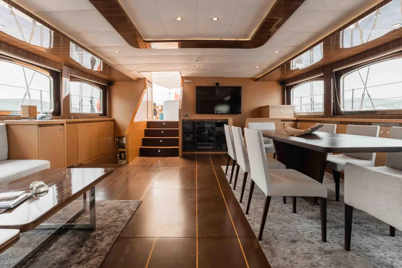 Le Pietre Yacht Photos Pics Luxurious interior of a 2009 custom sailing yacht with modern furnishings and large windows.