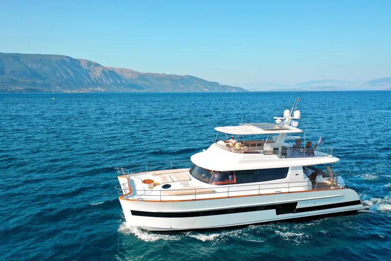  Yacht Photos Pics Luxury yacht Fountaine Pajot Queensland 55 cruising on blue ocean, 2010 model.