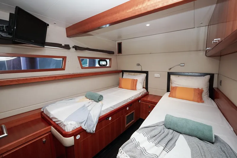  Yacht Photos Pics Luxurious twin cabin interior of 2010 Fountaine Pajot Queensland 55 yacht.