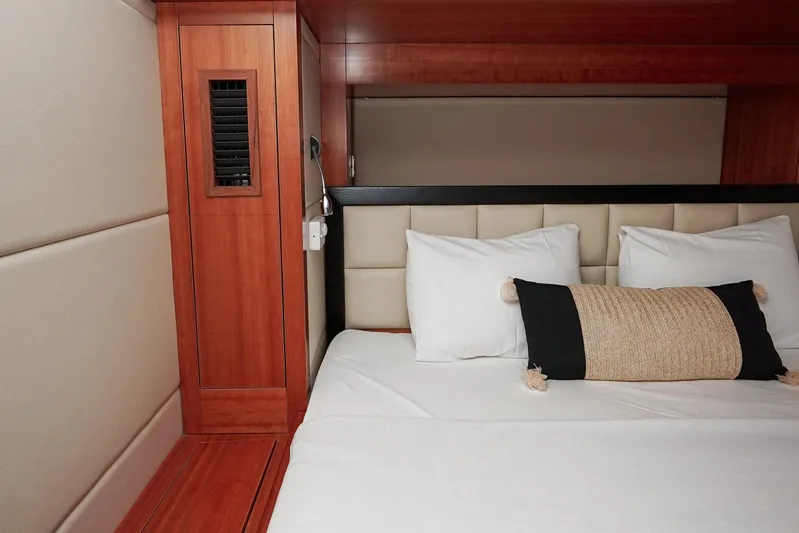  Yacht Photos Pics Luxurious cabin interior of 2010 Fountaine Pajot Queensland 55 yacht with elegant bedding.
