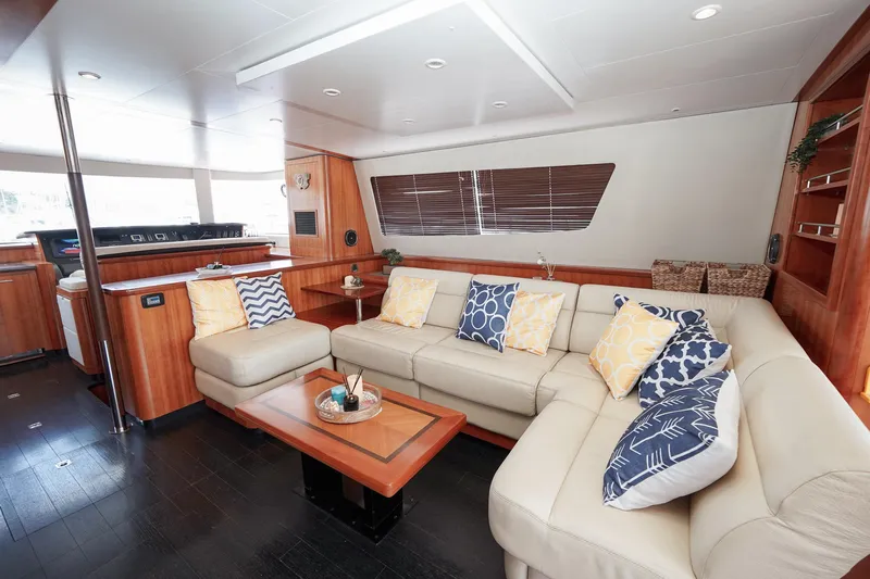  Yacht Photos Pics Luxurious interior of 2010 Fountaine Pajot Queensland 55 yacht with elegant seating and decor.