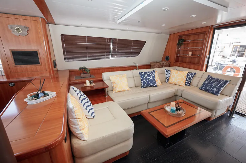  Yacht Photos Pics Luxurious interior of 2010 Fountaine Pajot Queensland 55 yacht with elegant seating and decor.