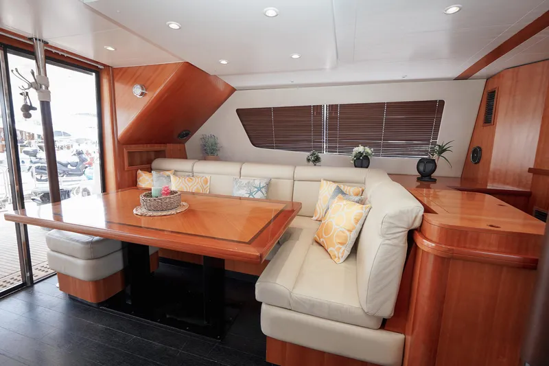 Yacht Photos Pics Luxurious interior of 2010 Fountaine Pajot Queensland 55 yacht with elegant seating and decor.
