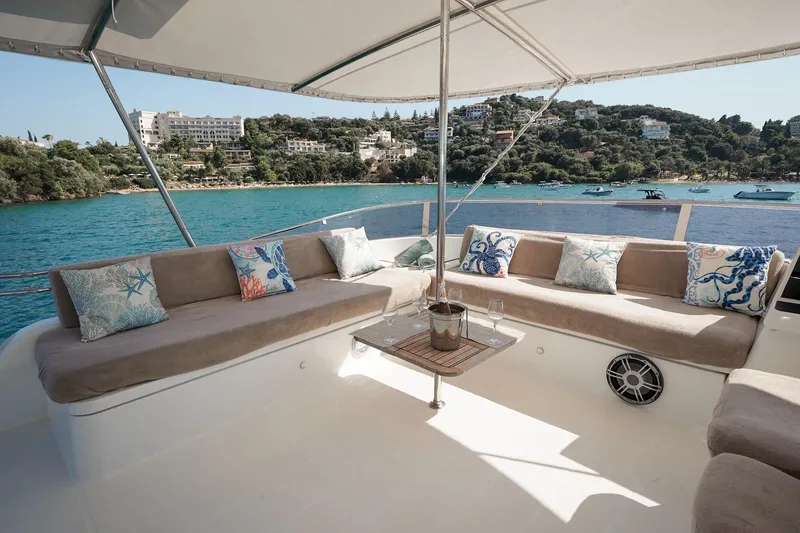  Yacht Photos Pics Luxurious 2010 Fountaine Pajot Queensland 55 yacht with spacious seating and scenic ocean view.