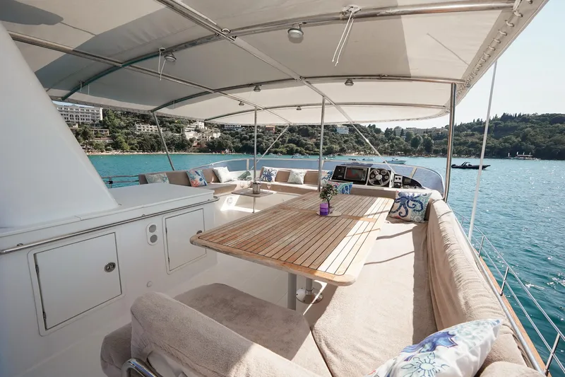  Yacht Photos Pics Luxurious 2010 Fountaine Pajot Queensland 55 yacht with spacious deck and scenic ocean view.