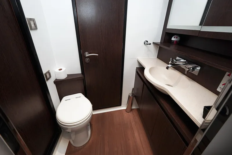  Yacht Photos Pics Luxurious bathroom in 2010 Fountaine Pajot Queensland 55 yacht with modern fixtures.