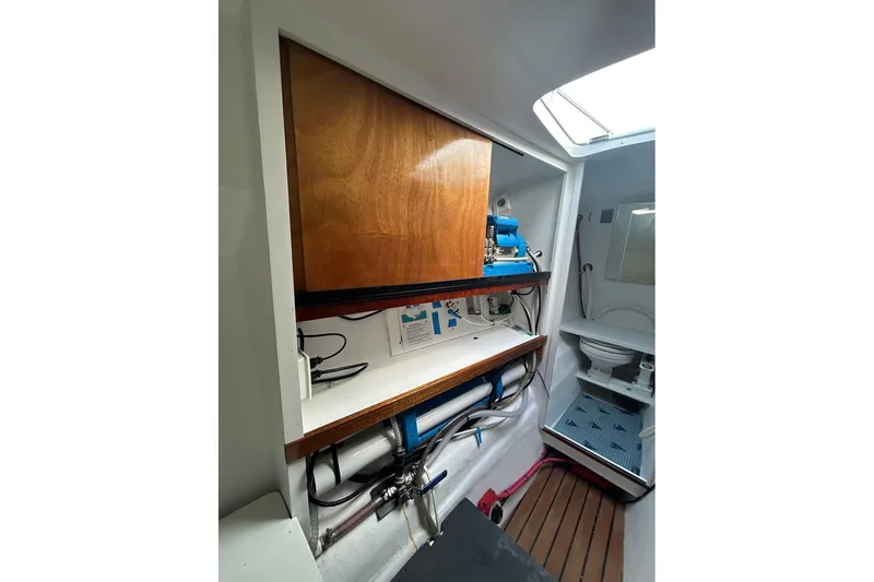 Jonny Wasabi Yacht Photos Pics Interior of 2002 Custom 64 Stuart Catamarans showing bathroom and storage area.