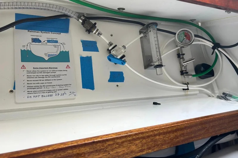 Jonny Wasabi Yacht Photos Pics Rainman system setup on 2002 Custom 64 Stuart Catamarans, featuring gauges and tubing.