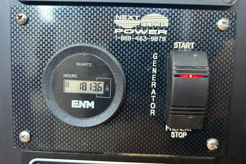 Jonny Wasabi Yacht Photos Pics Generator control panel with hour meter reading 1813.6 on 64 Stuart Catamarans, 2002 model.