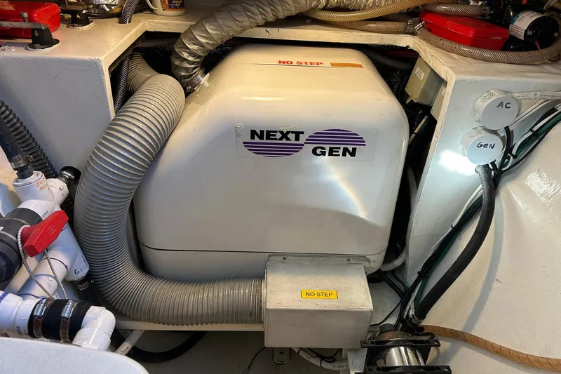 Jonny Wasabi Yacht Photos Pics Engine room of 2002 Custom 64 Stuart Catamarans with Next Gen generator.