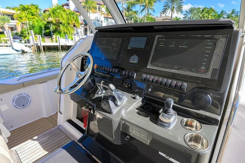 Leap Year Yacht Photos Pics 2018 Pursuit S 408 Sport boat dashboard with advanced navigation controls and displays.