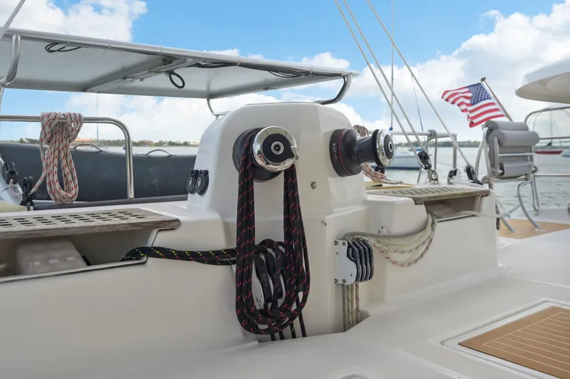 Zephyr Yacht Photos Pics Catana 42 sailboat deck with winches and American flag, 2016 model.