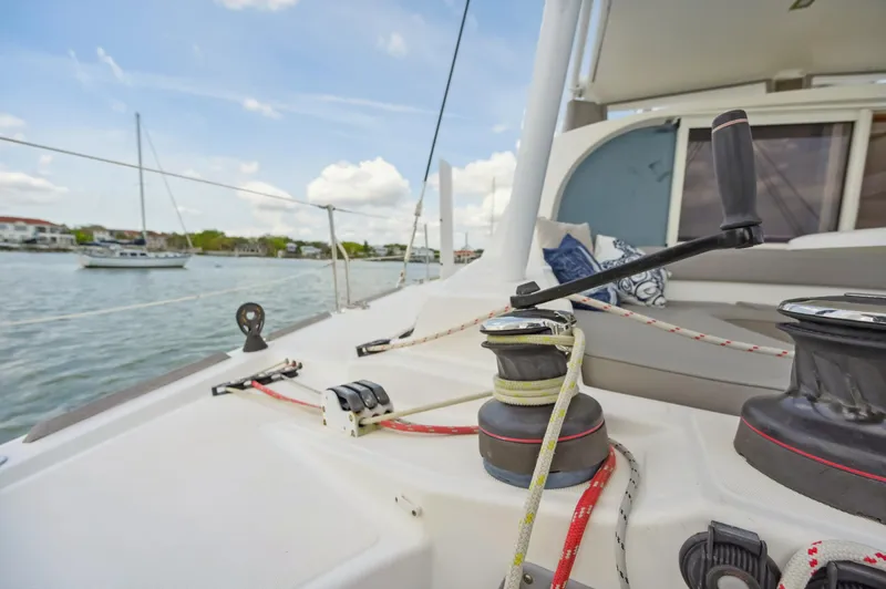 Zephyr Yacht Photos Pics Catana 42 sailboat deck view, 2016 model, with winches and ropes, sailing on calm waters.