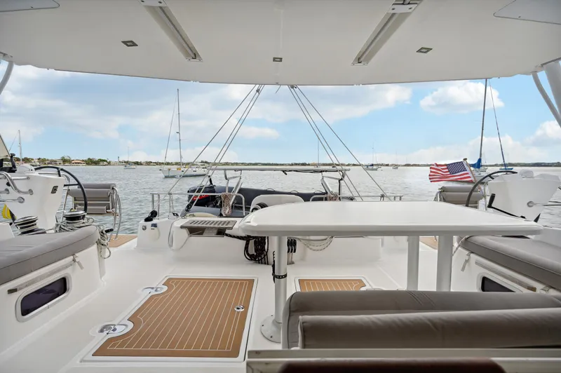 Zephyr Yacht Photos Pics Spacious deck of 2016 Catana 42 catamaran with seating and ocean view.