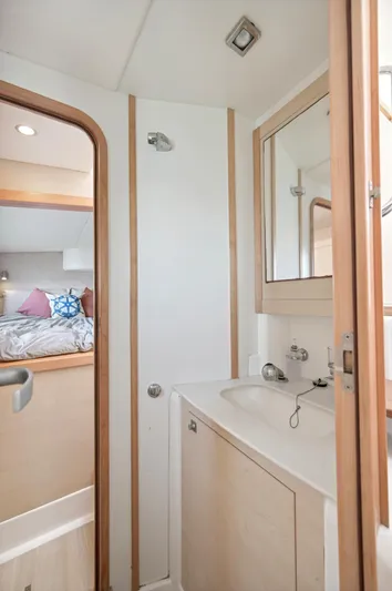 Zephyr Yacht Photos Pics 2016 Catana 42 yacht interior bathroom with sink and mirror.