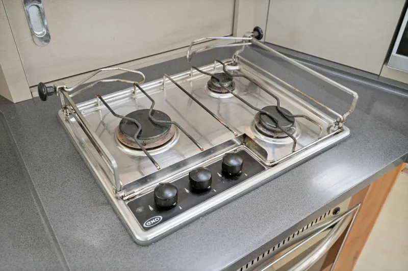 Zephyr Yacht Photos Pics Stainless steel two-burner stove in 2016 Catana 42 yacht kitchen.