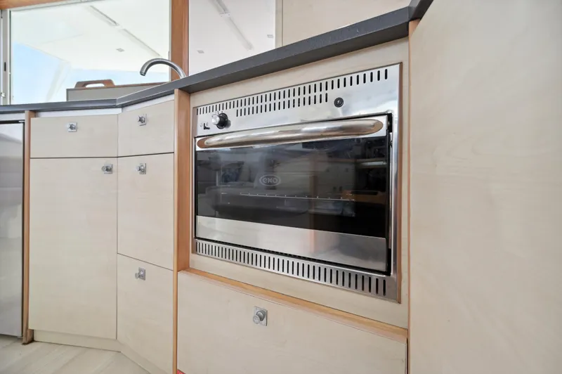 Zephyr Yacht Photos Pics Modern kitchen oven in 2016 Catana 42 yacht interior.