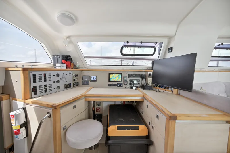 Zephyr Yacht Photos Pics Catana 42 yacht navigation station, 2016 model, featuring control panels and a monitor.
