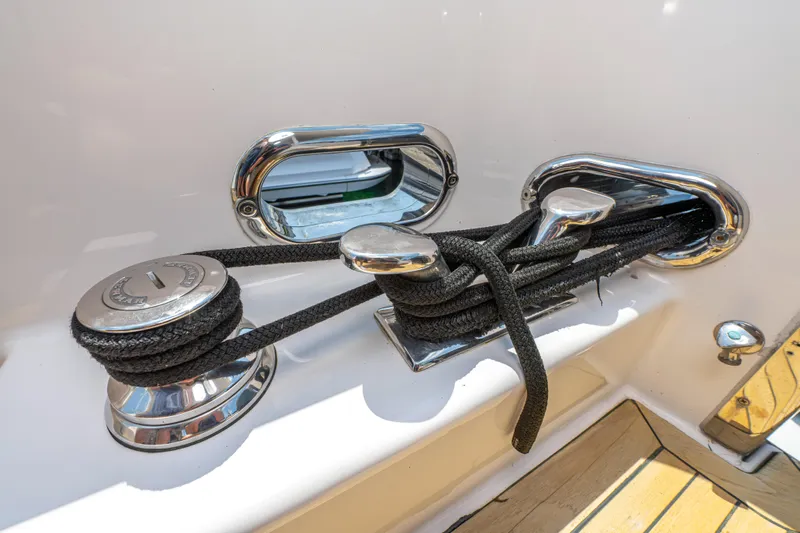  Yacht Photos Pics Close-up of mooring cleats and ropes on a 2005 Pacific Mariner 85 Motor Yacht.