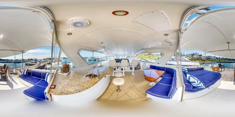  Yacht Photos Pics Luxurious 2005 Pacific Mariner 85 Motor Yacht with spacious deck and modern seating.