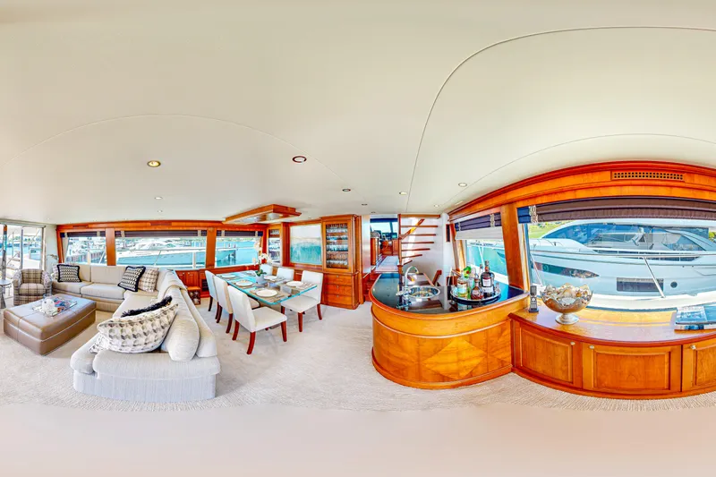  Yacht Photos Pics Luxurious interior of 2005 Pacific Mariner 85 Motor Yacht with elegant furnishings and panoramic windows.