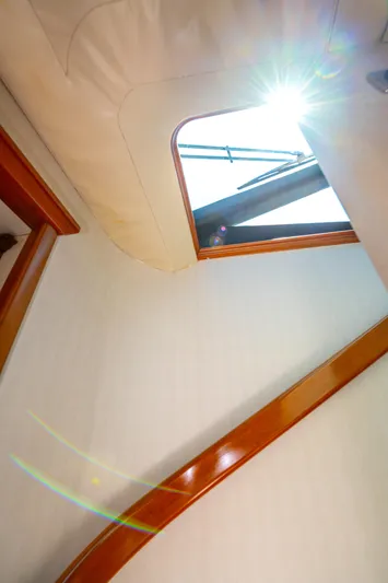  Yacht Photos Pics Interior view of 2005 Pacific Mariner 85 Motor Yacht with sunlight through hatch.